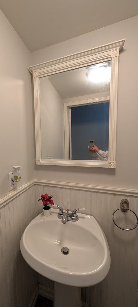 White framed bathroom mirror