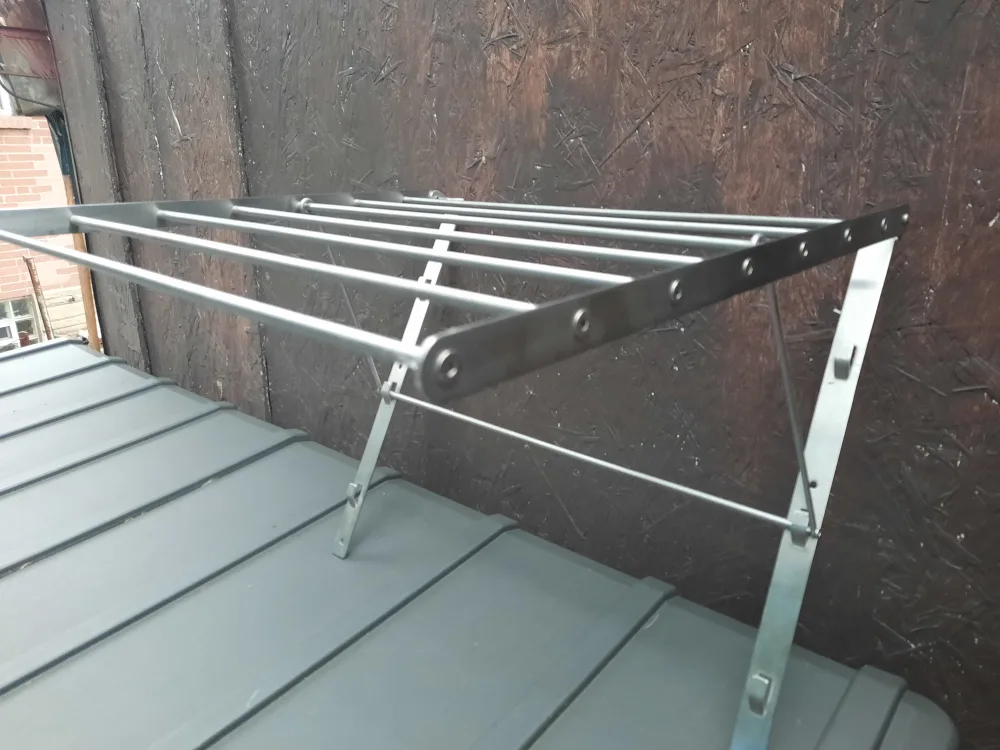 Like New collapsible wall mounted clothes rack image indicator(5)