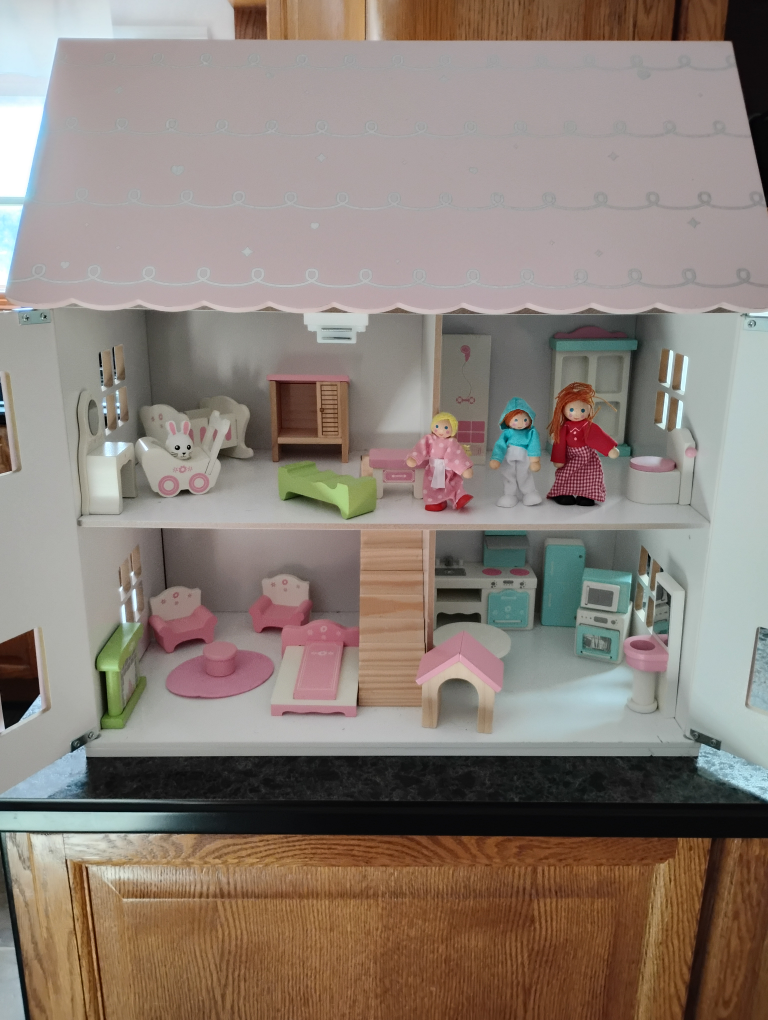Adorable Pink Wooden Dollhouse with Furniture and Figures