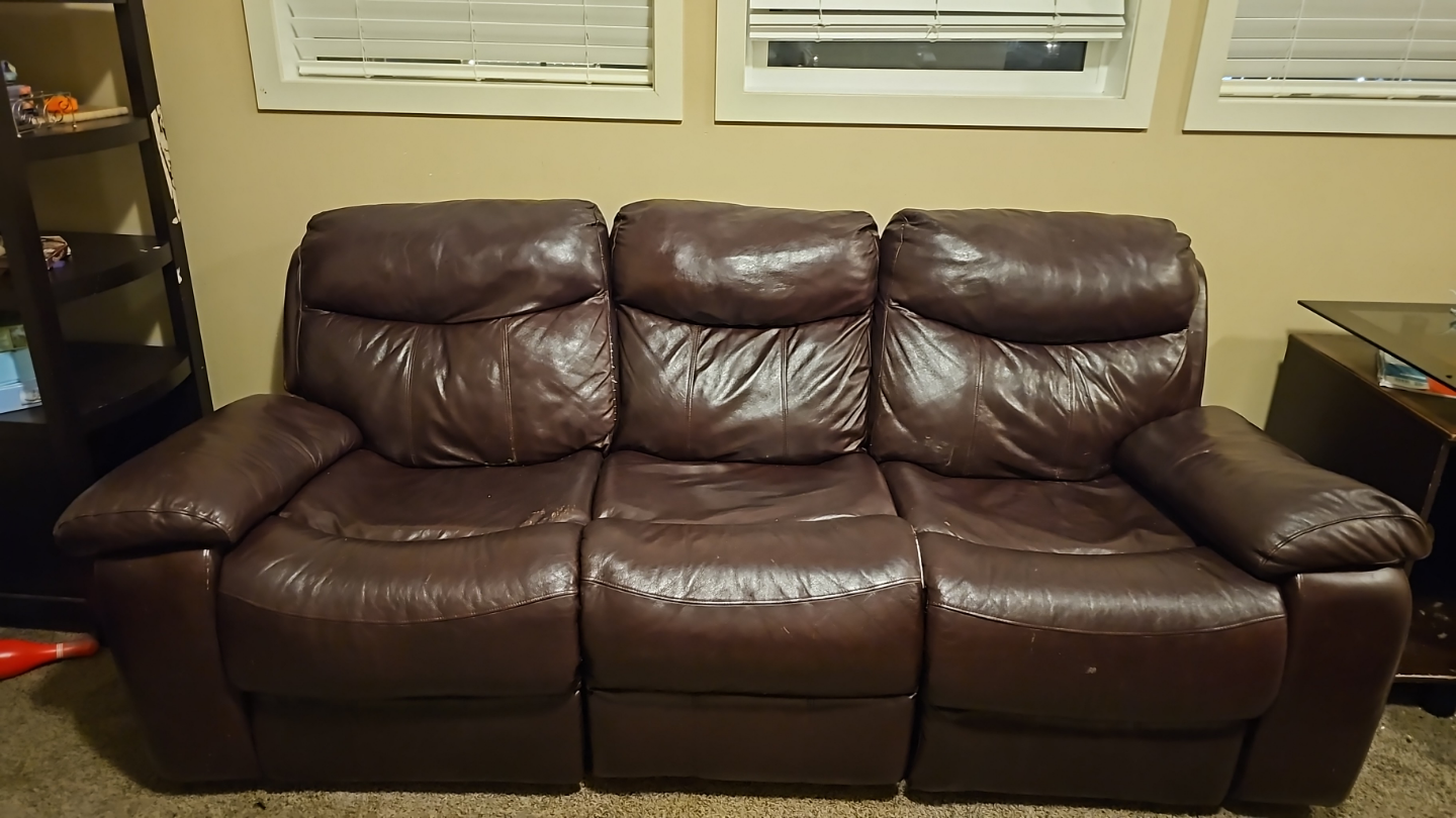 Brown Leather Reclining Sofa