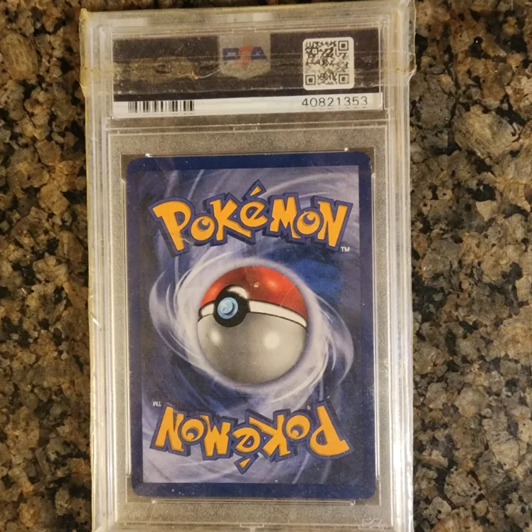 1999 Pokemon Charizard Holo  4/102 PSA 8 image indicator(2)