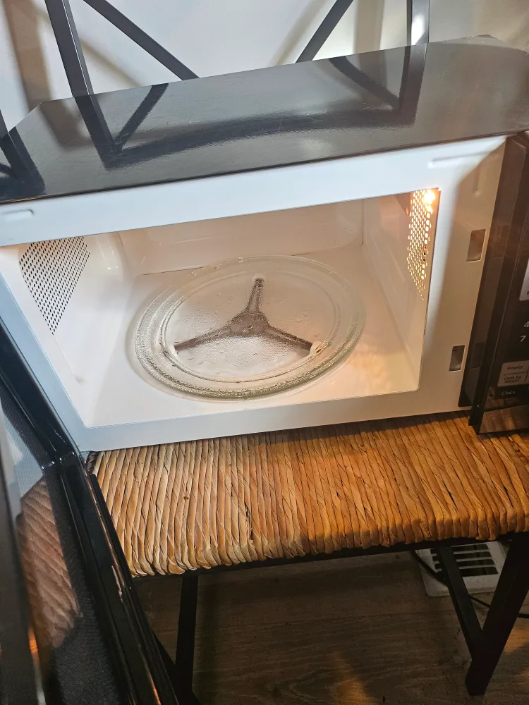 Oster used Black & Silver Countertop Microwave image indicator(2)