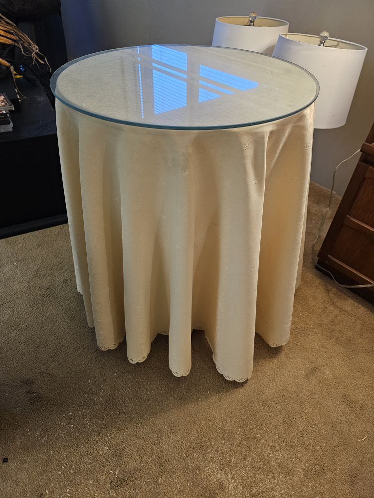 Round Glass Top Occasional Table with Cream Tablecloth