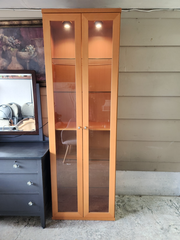 Light Oak Display Cabinet with Glass Doors and Interior Lighting