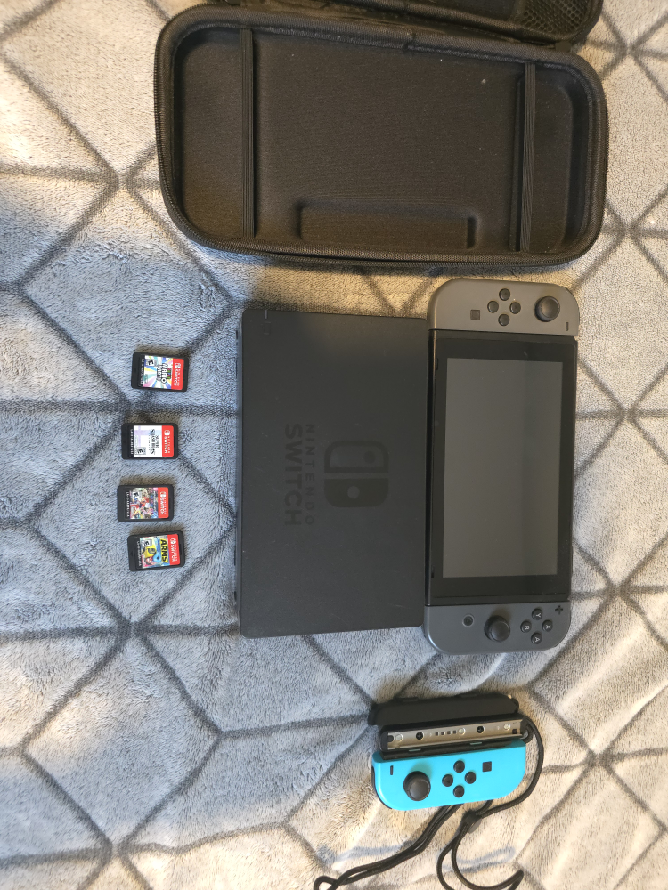 Nintendo Switch Console with Games and Carrying Case