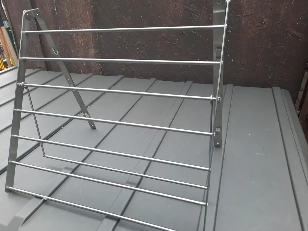 Like New collapsible wall mounted clothes rack image indicator(3)