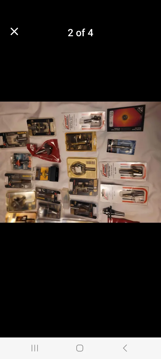 Lot of woodworking router bits and tools with metal toolbox image indicator(4)