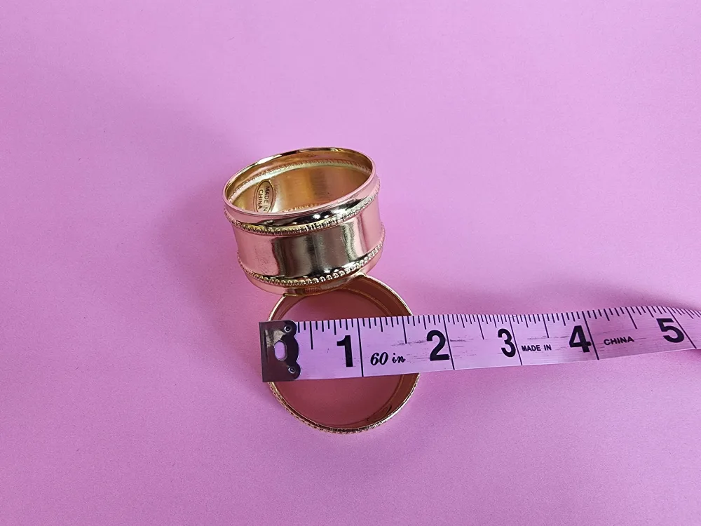 Gold Metal Napkin Rings Set of Eight (Plastic) image indicator(2)
