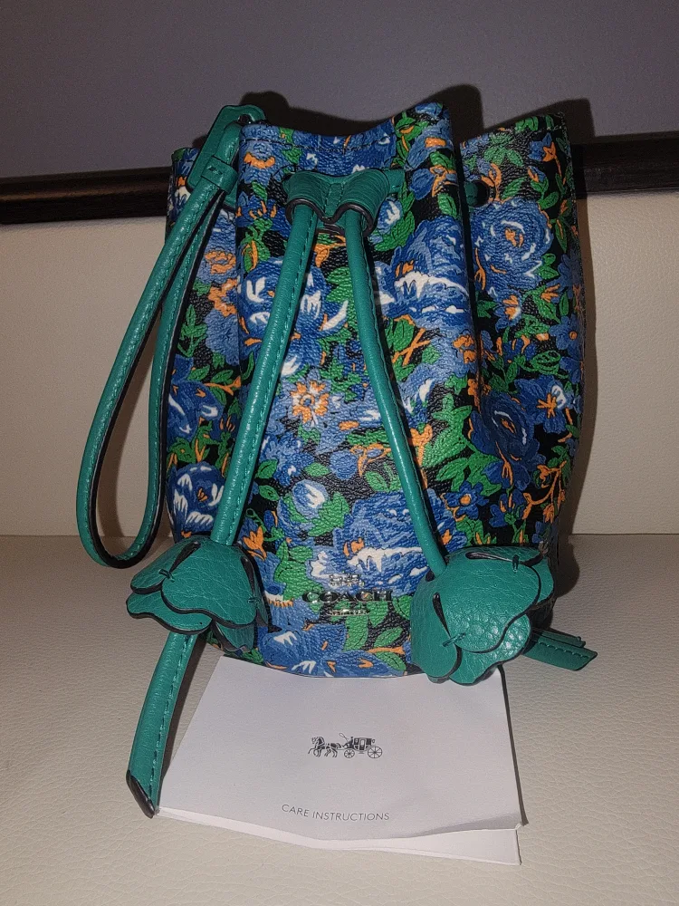 COACH BUCKET PETAL WRISTLET image indicator(2)