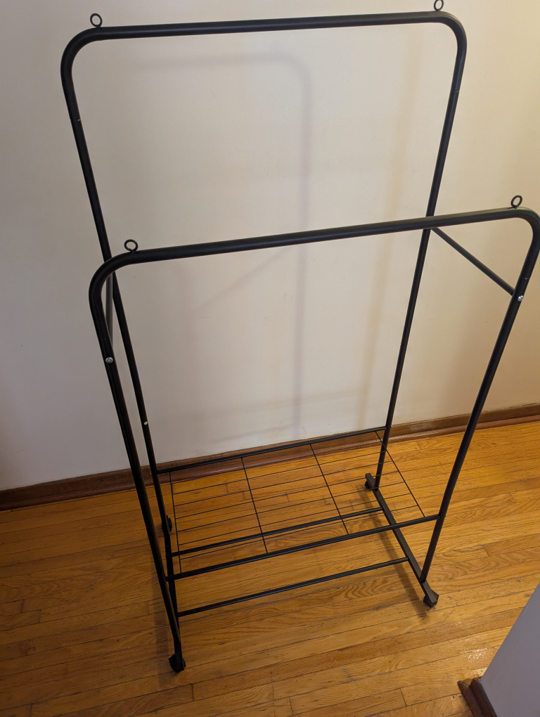 Double Garment Rack with Shelf and Wheels