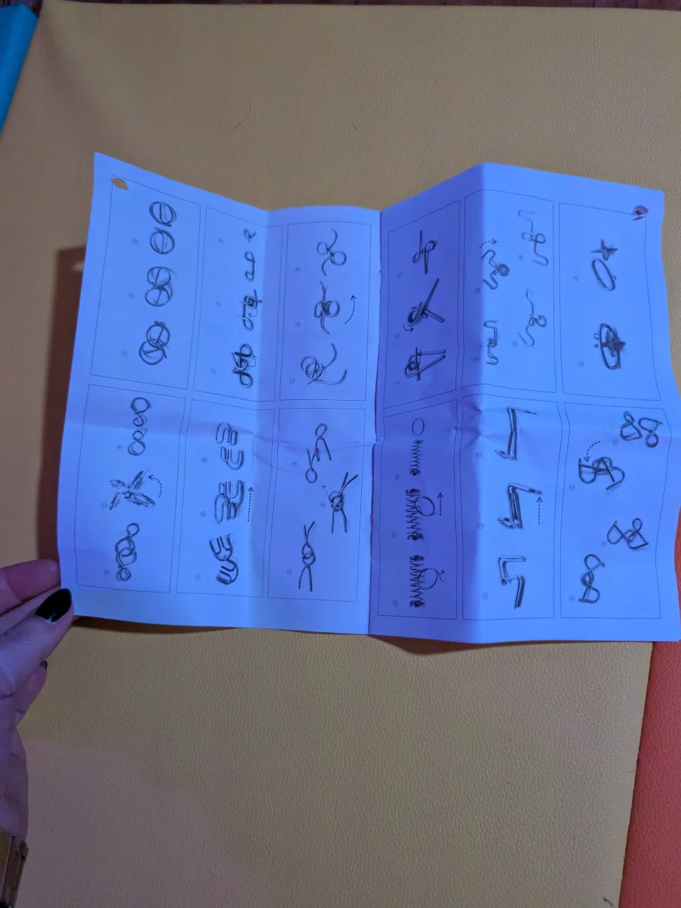 16 Metal Brain teaser Puzzles with answer paper image indicator(3)