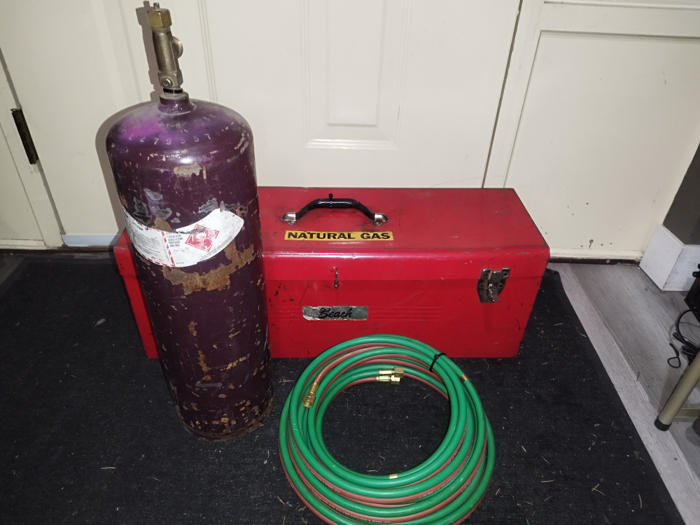 Small acetylene tank, regulator and hoses