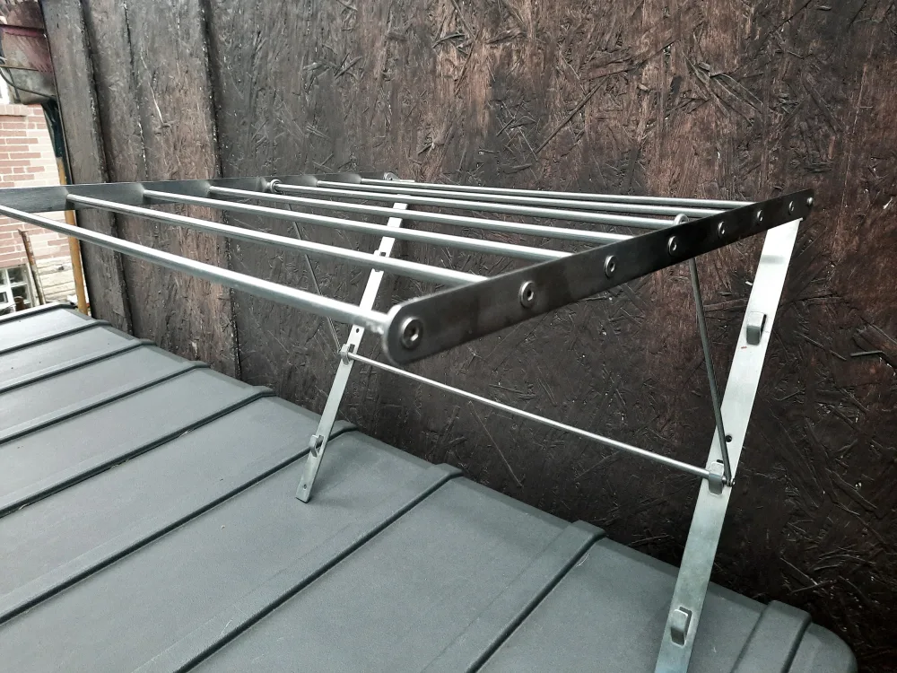 Like New collapsible wall mounted clothes rack image indicator(4)