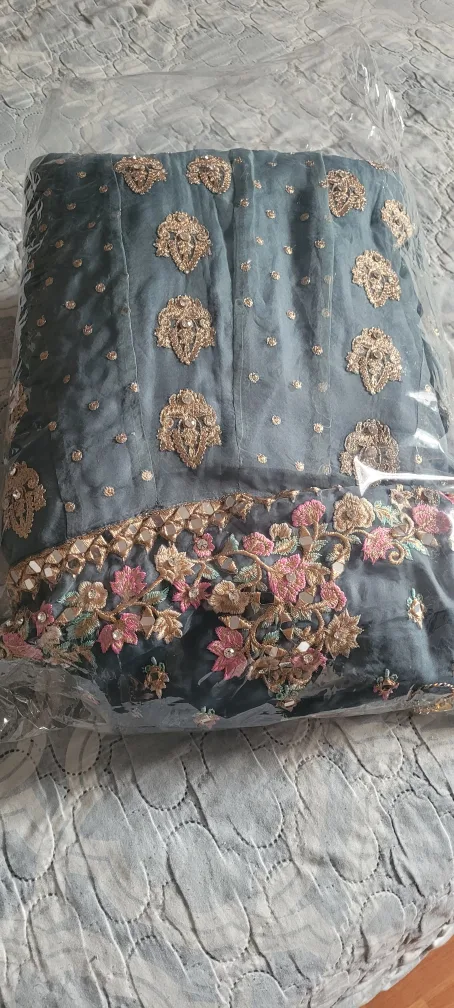 Gorgeous embroidered teal Pakistani Shalwar Kameez image indicator(3)