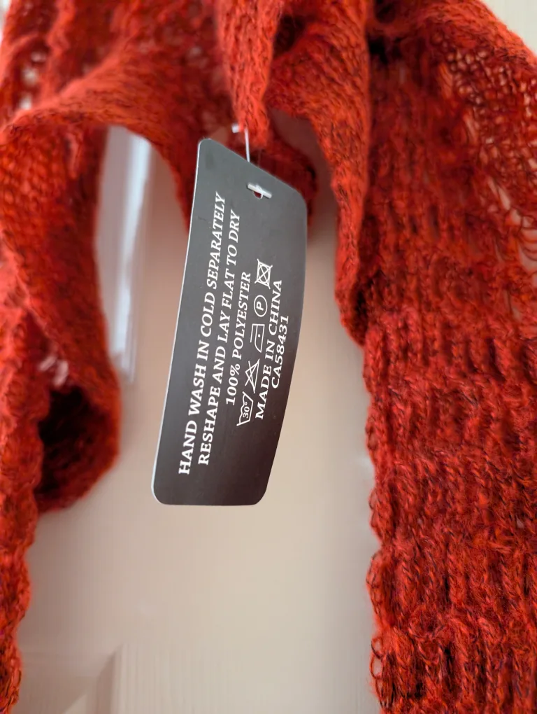 Rust-coloured Knitted Scarf with Pom-poms image indicator(5)