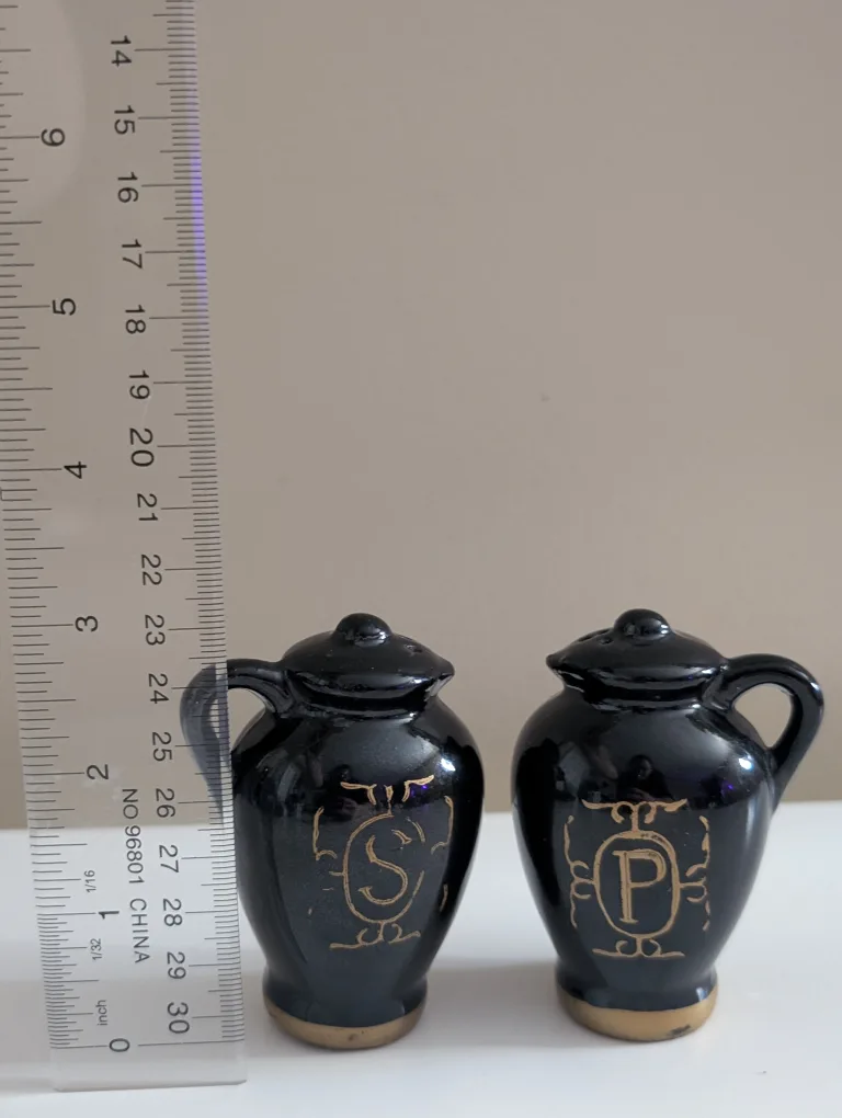 Vintage Black Salt and Pepper Shakers image indicator(2)