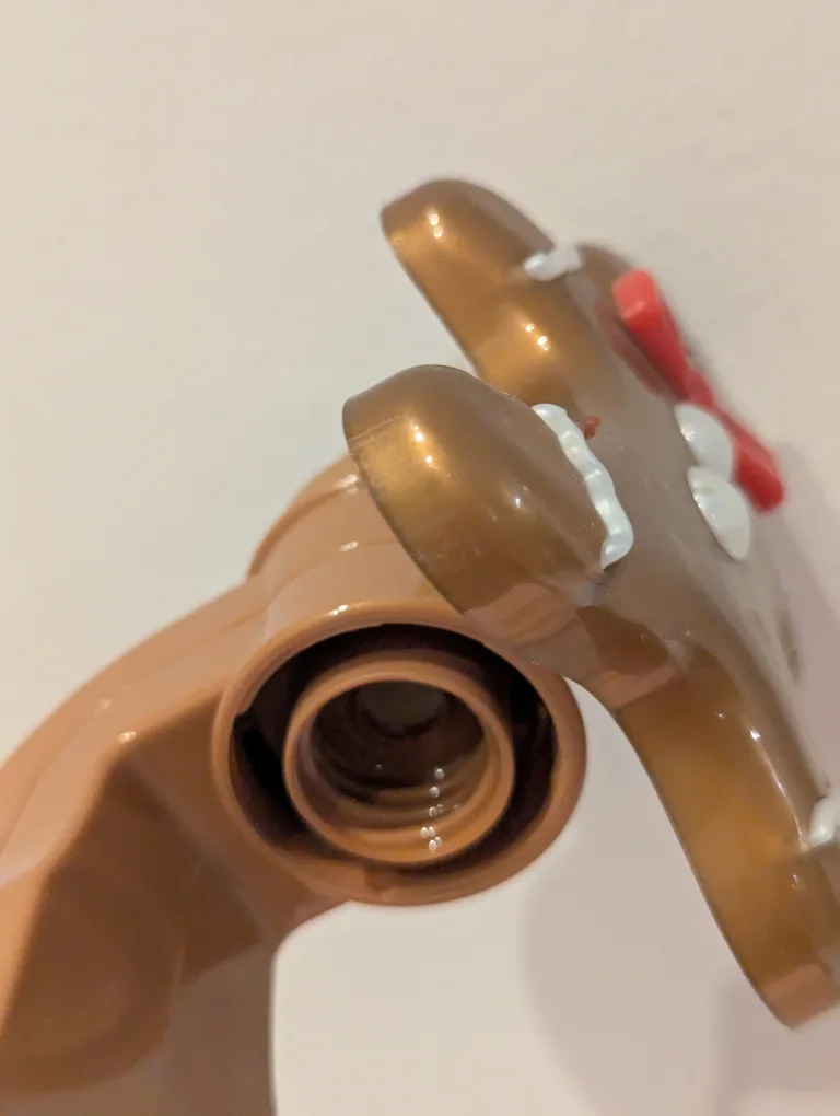 Bath & Body Works wallflower plug-in with gingerbread man design image indicator(3)