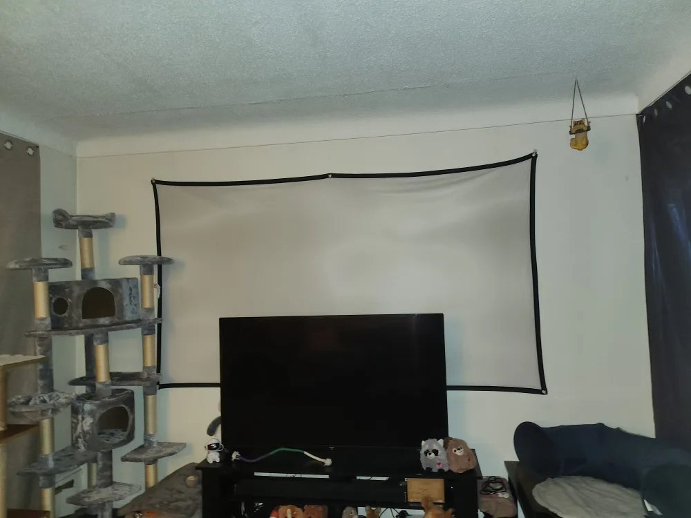 RCA 21 Mini Projector with Bluetooth and 100" Fold-Up Screen image indicator(4)