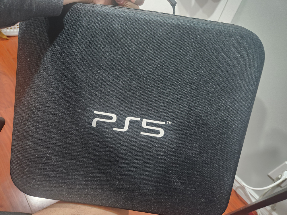 PlayStation 5 Console with Two Controllers and Carrying Case - photo 3