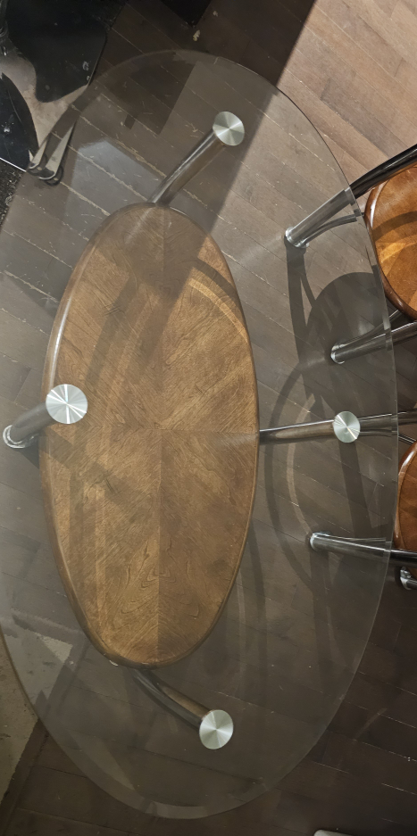 One Oval Glass Top Coffee Table and two Glass Top side tables