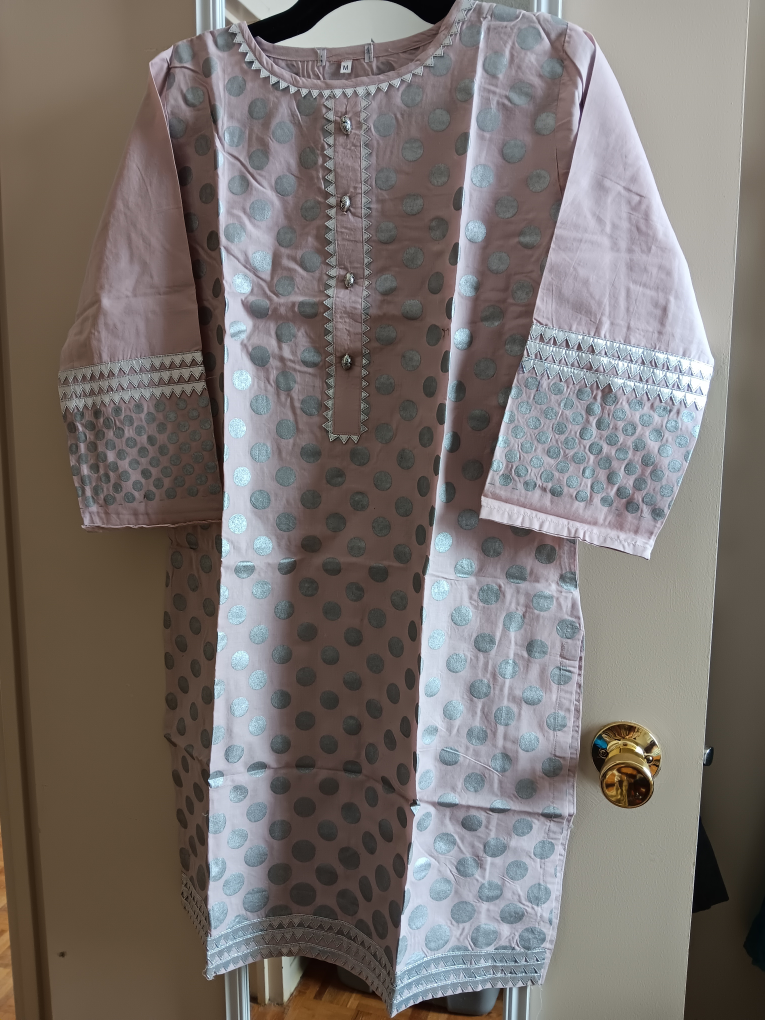 Three beautiful embroidered tunics