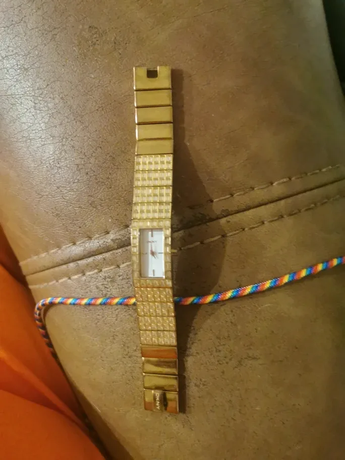 DKNY Gold Tone Watch with Crystal Accents image indicator(3)