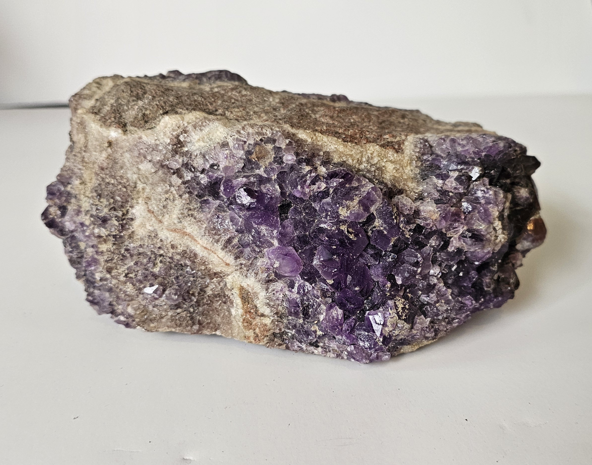 Assorted Polished Stone Spheres and Amethyst Cluster