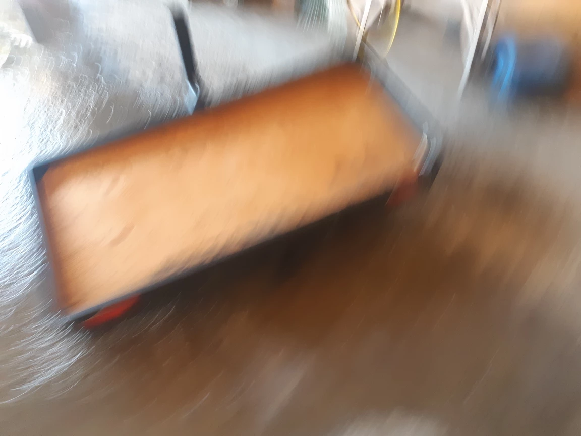 Hitch-mounted cargo carrier