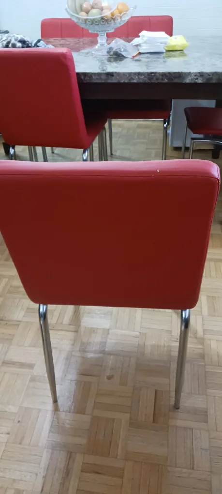 Red leather dinning chairs each $25 image indicator(3)