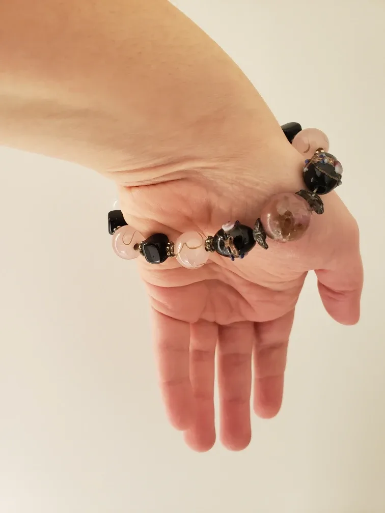 Purple, pink and black elastic beaded bracelet image indicator(3)