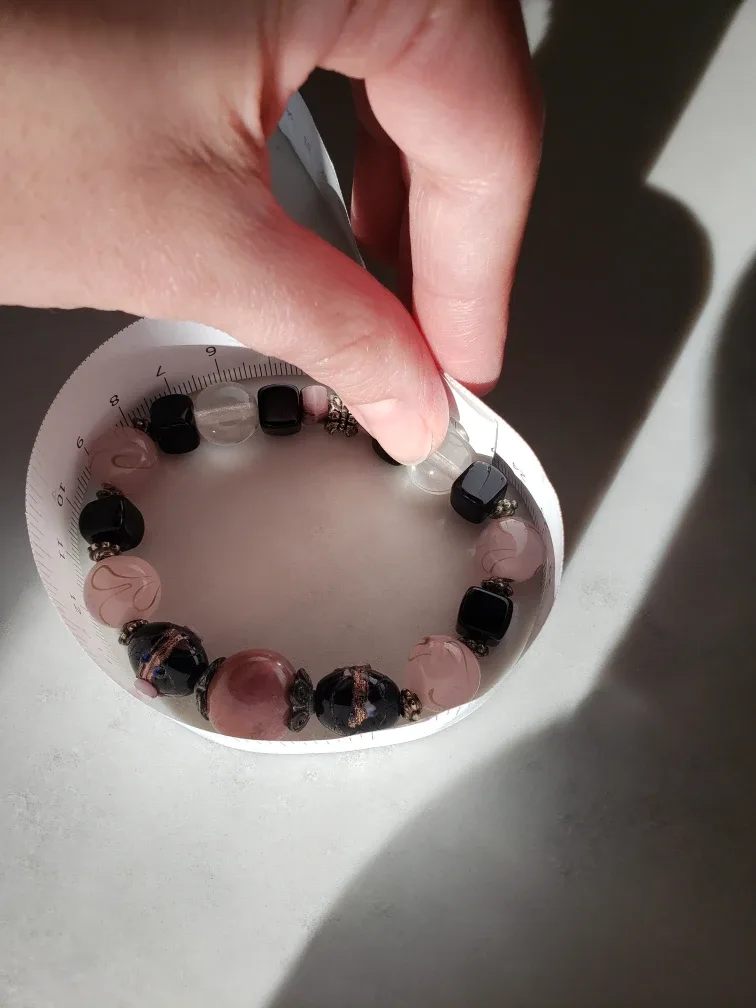 Purple, pink and black elastic beaded bracelet image indicator(4)