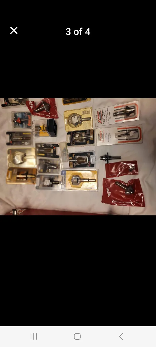 Lot of woodworking router bits and tools with metal toolbox image indicator(2)