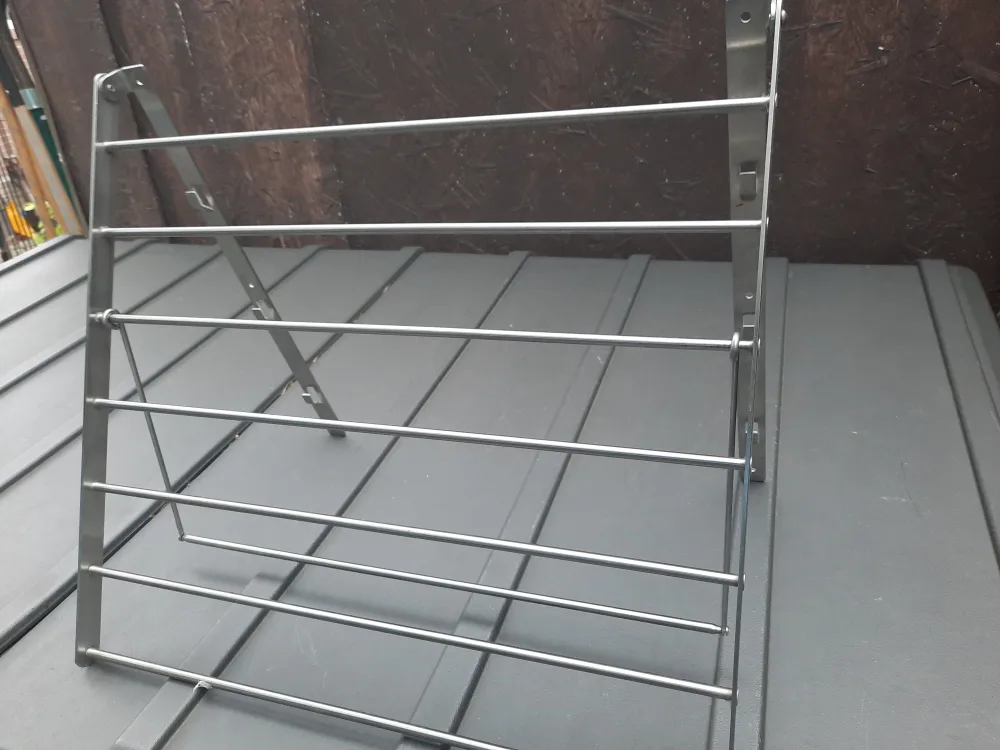 Like New collapsible wall mounted clothes rack image indicator(6)