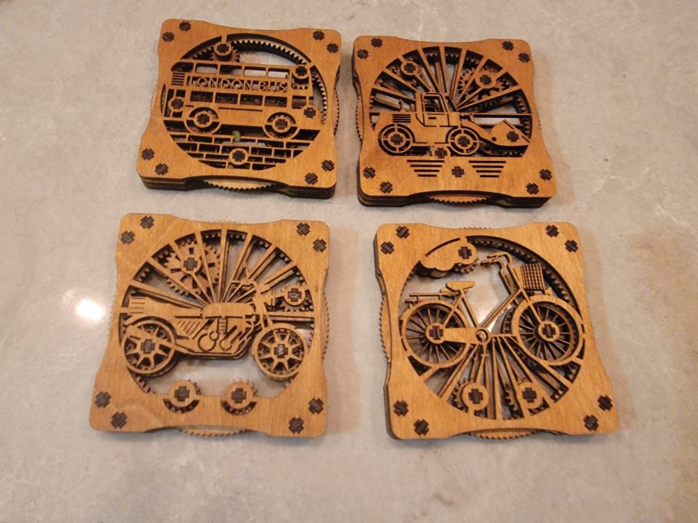 Set of Four Wooden Coasters with Transportation Designs