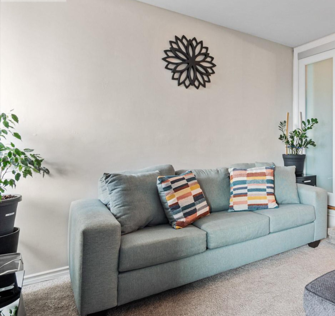 Moving sale .Light Teal Sofa with Throw Pillows