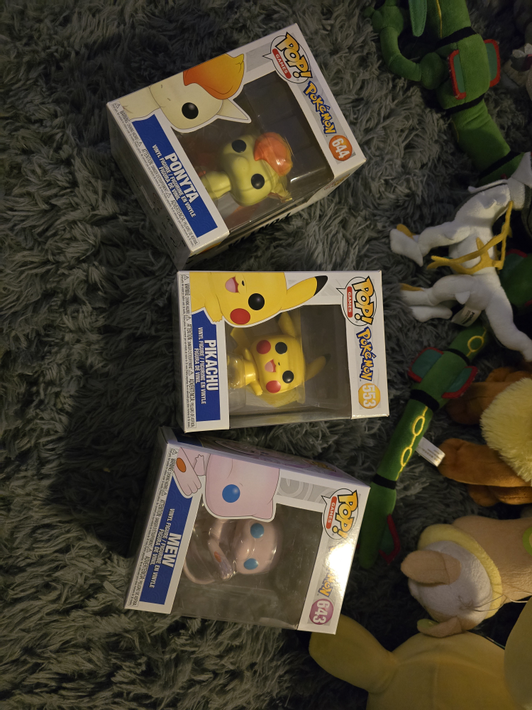 Three Pokémon Pop! Vinyl Figures: Ponyta, Pikachu, and Mew