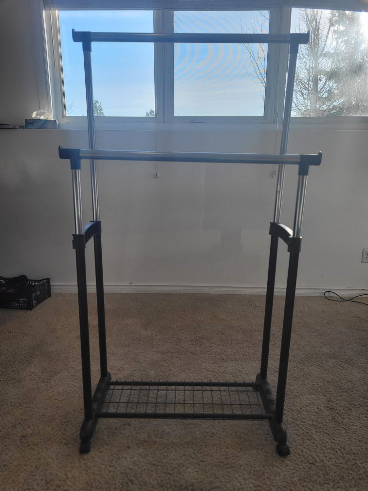Double Clothing Rack with Rolling Wheels