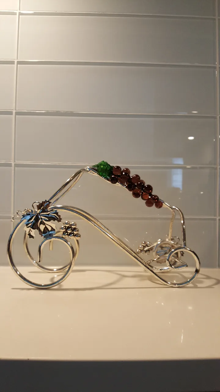 Wine Bottle Holder with Grape Detail image indicator(2)