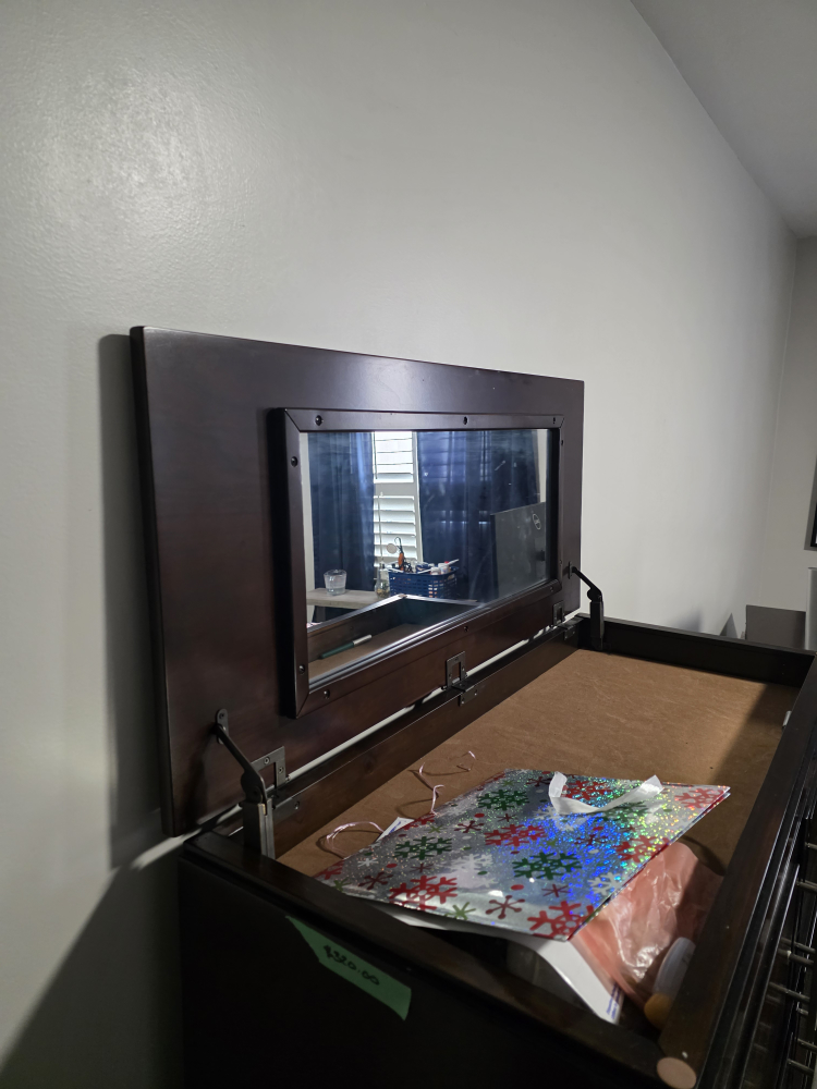 Dark brown dresser with mirror