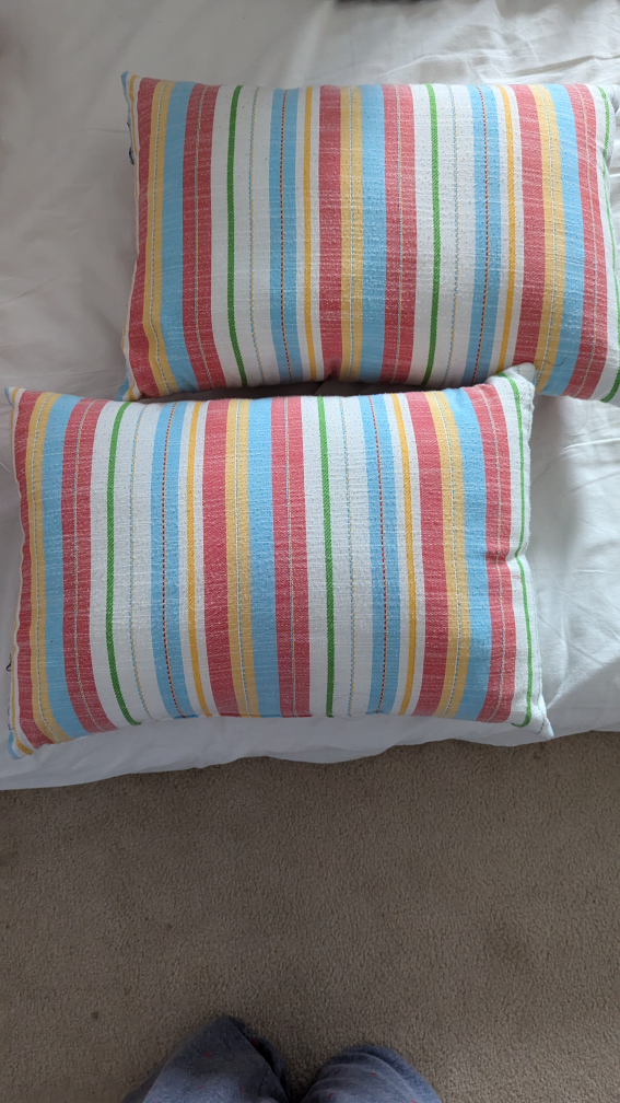 Four decorative pillows – two peach, two striped - photo 2