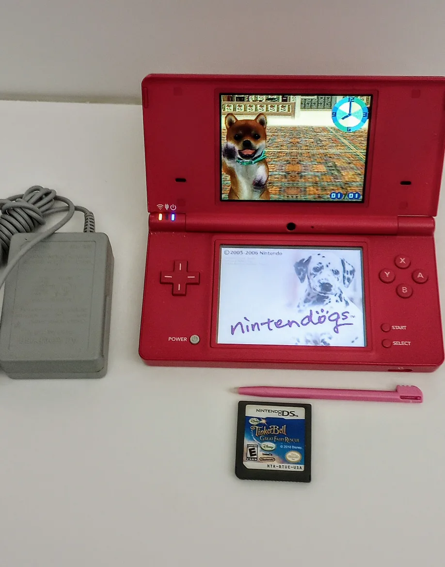 Nintendo DSi Pink w/ Stylus, Charger & 2 game carts. image indicator(3)