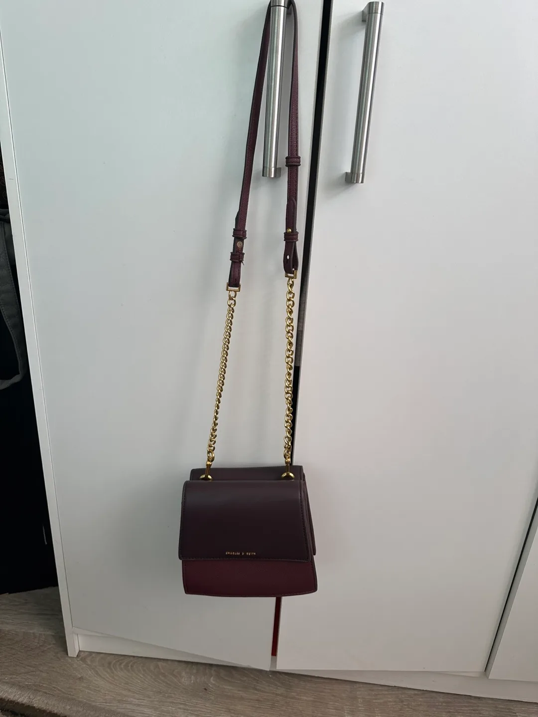 Charles & Keith Burgundy Crossbody Bag image indicator(2)