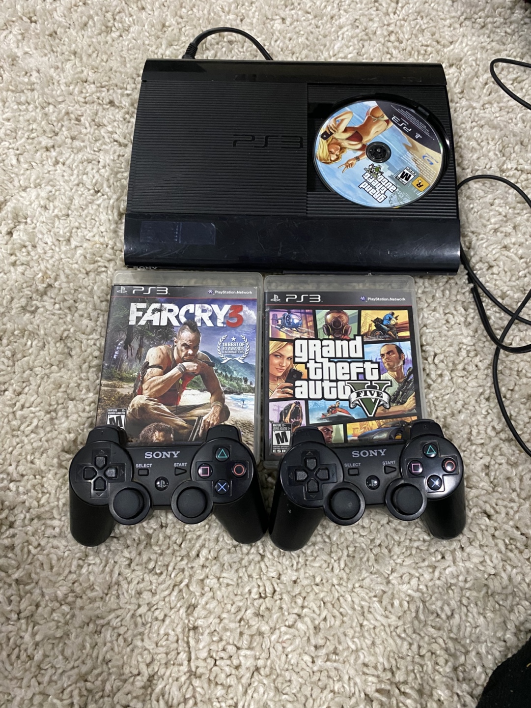 PS3 Console with 2 Controllers and Games