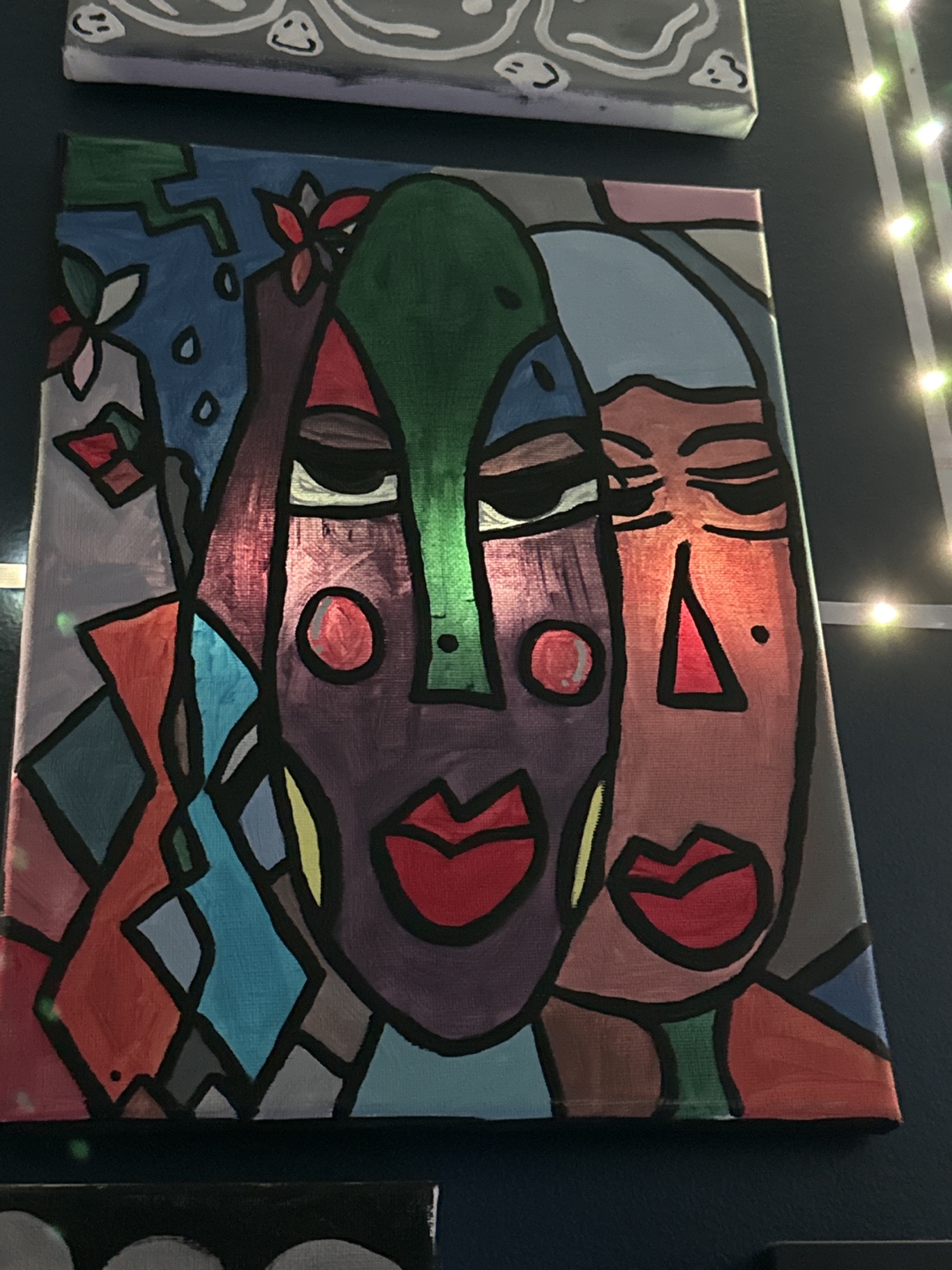 Abstract Cubist-Style Painting of Two Faces