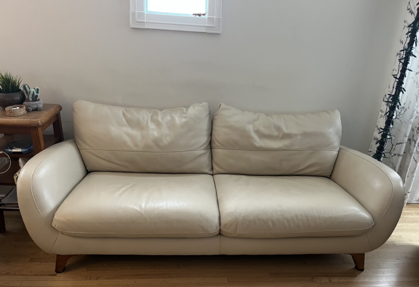 Itaisofa leather sofa beige in colour 84” long and 38” deep