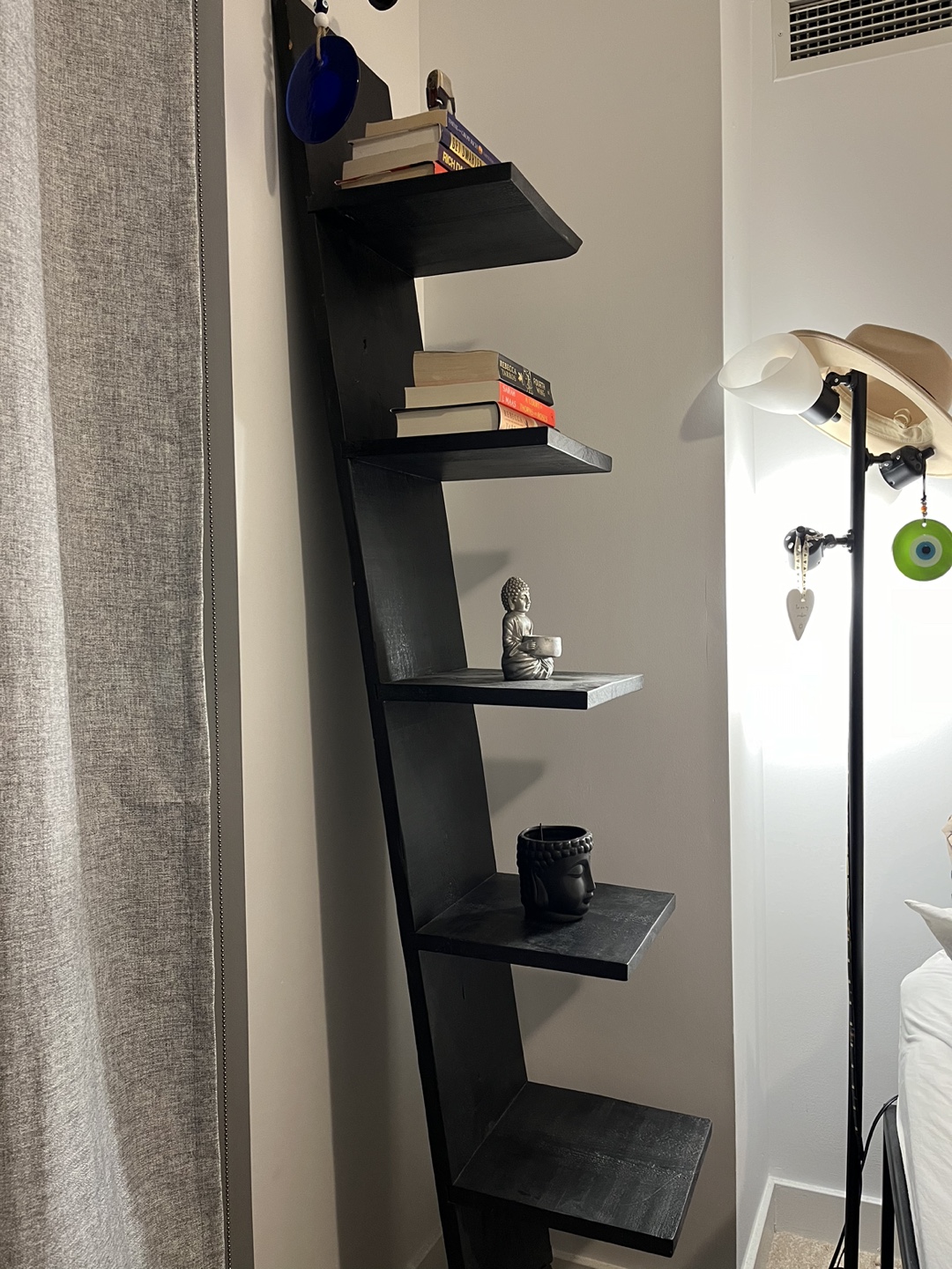 Black leaning ladder shelf
