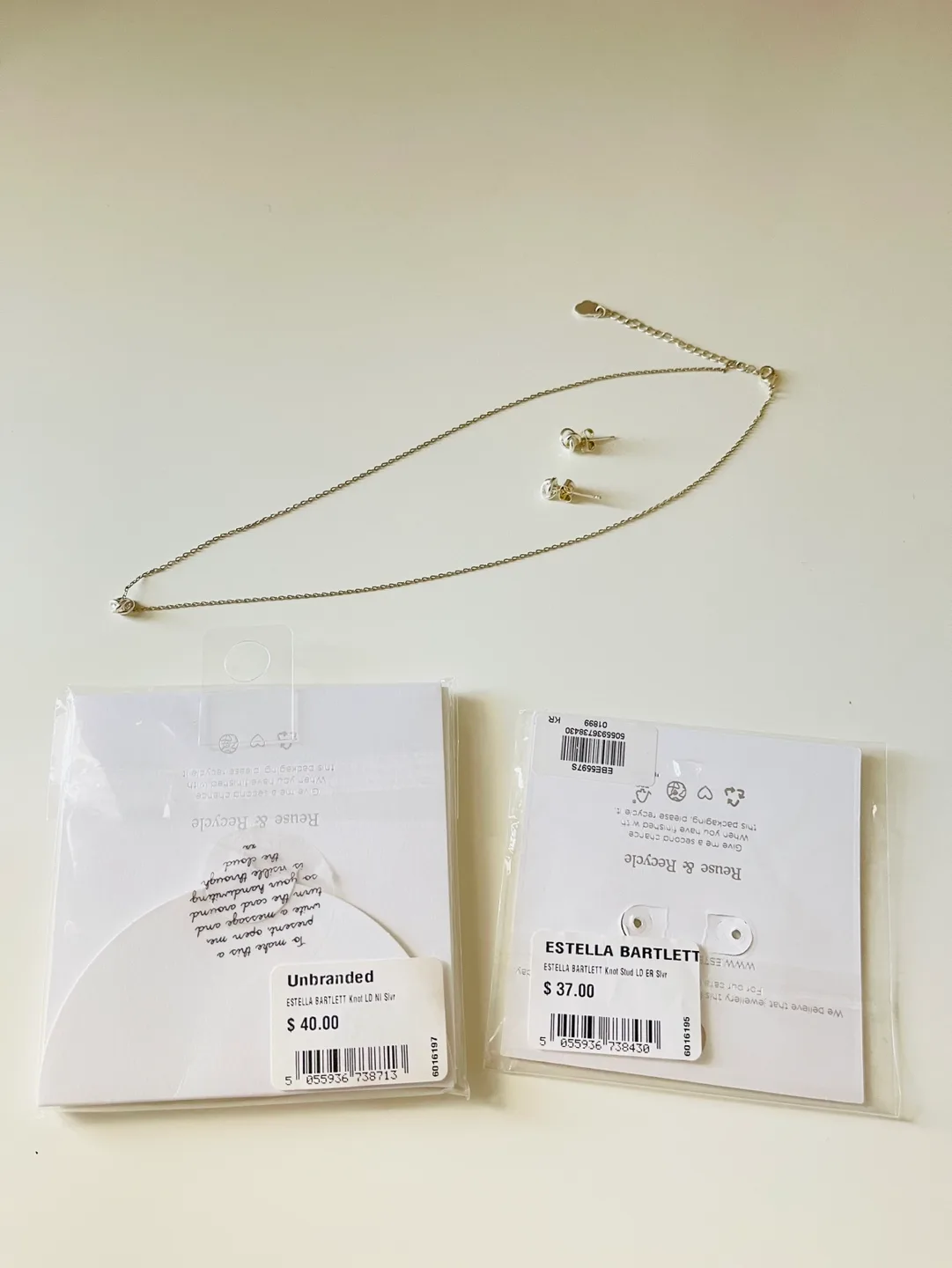 Estella Bartlett Love Me Knot Necklace and Earrings Set image indicator(6)