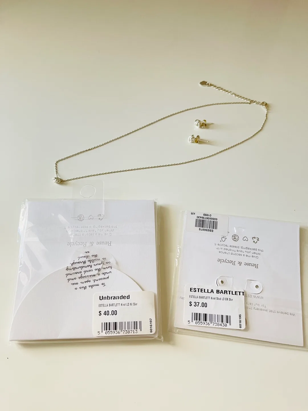 Estella Bartlett Love Me Knot Necklace and Earrings Set image indicator(7)