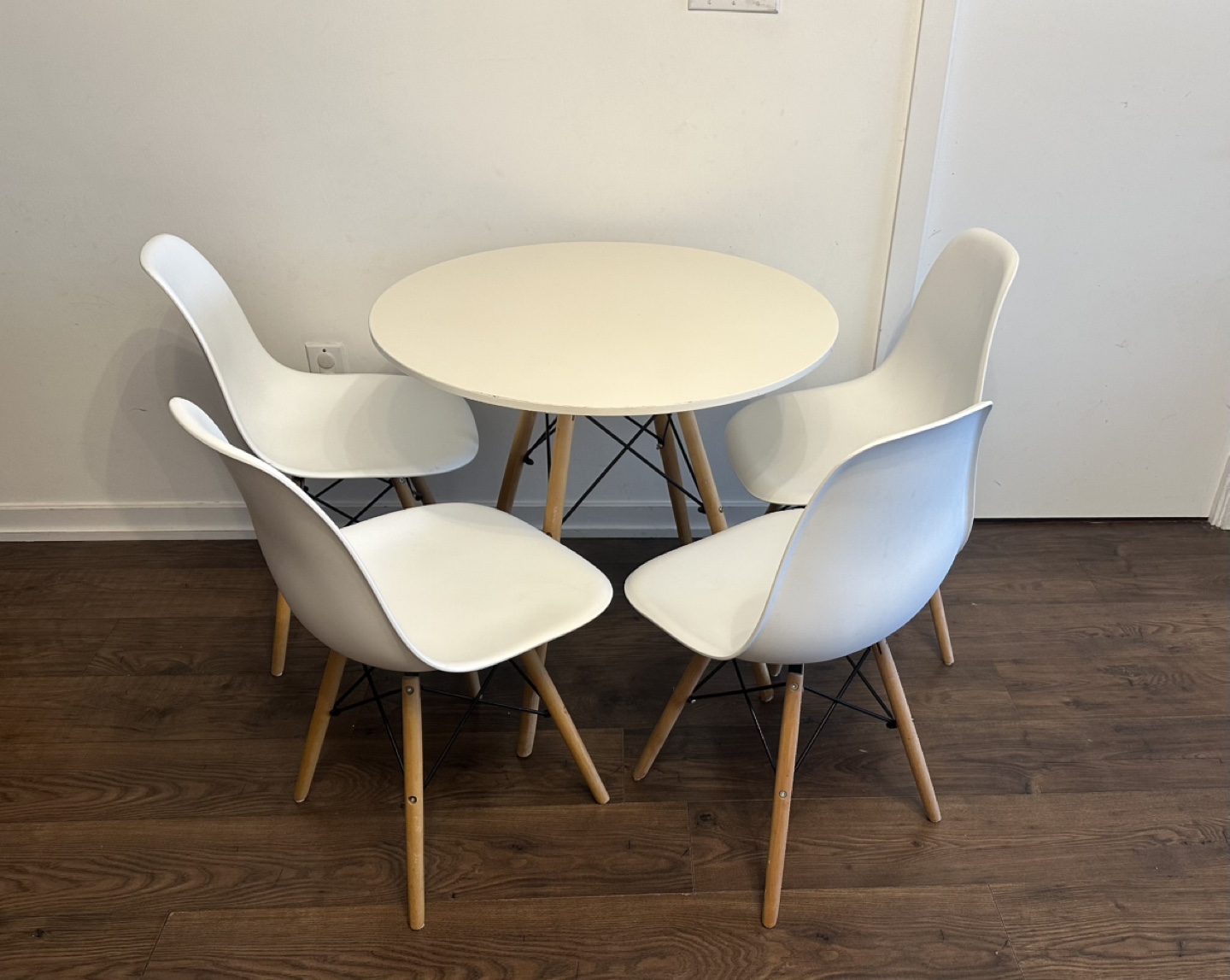 White Round Table and Four Chairs Set