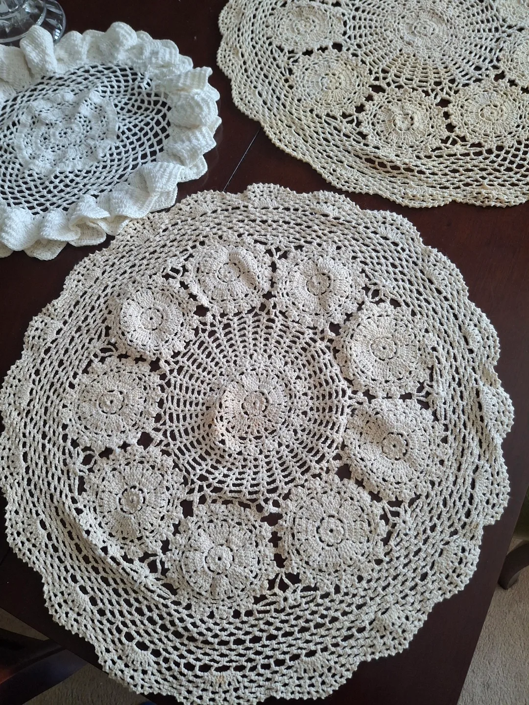 Set of three vintage crocheted doilies/table coverings image indicator(4)